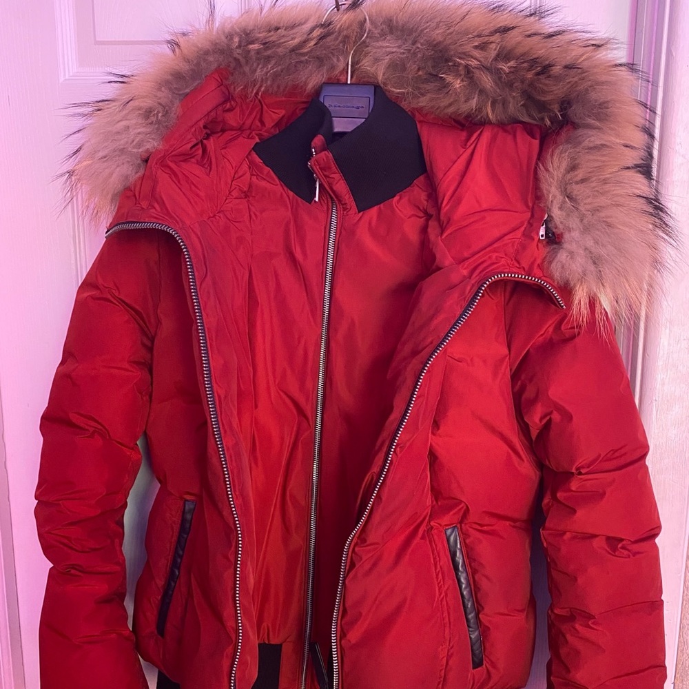Red Mackage with brown fur.. Worn, price is negotiable! Available to ship asap.